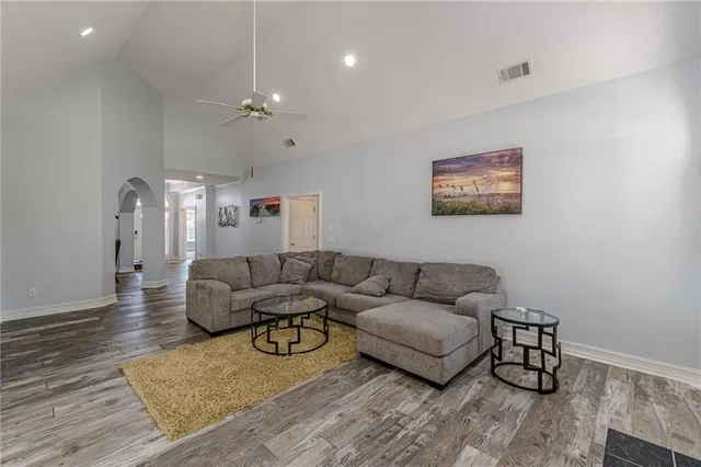 a kitchen with stainless steel appliances granite countertop a refrigerator and cabinets
