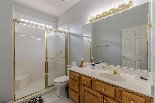 a living room with furniture a couch and chandelier