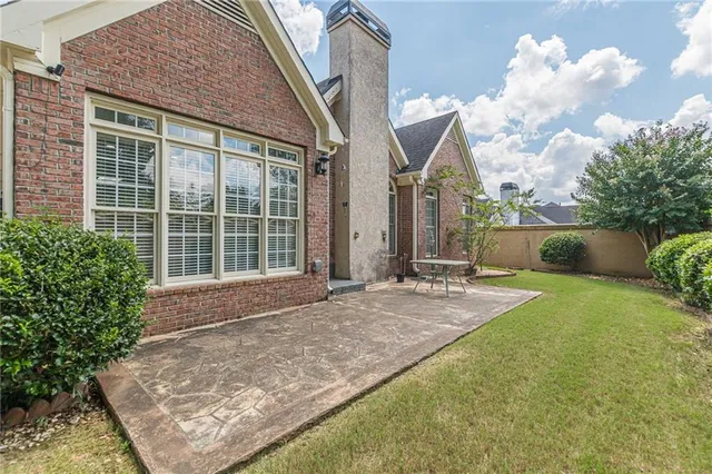 a view of a livingroom with furniture and stairs