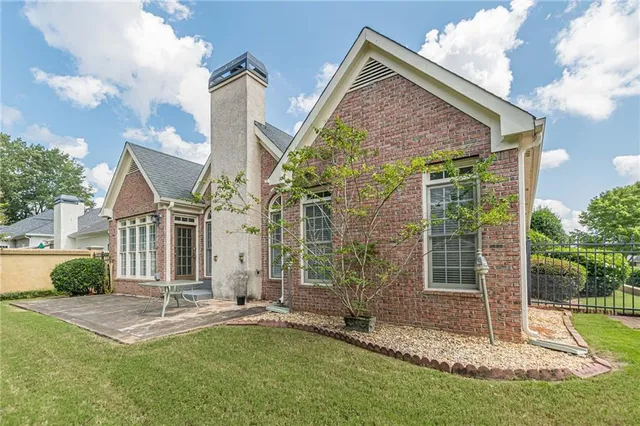 a view of a livingroom with furniture and staircase