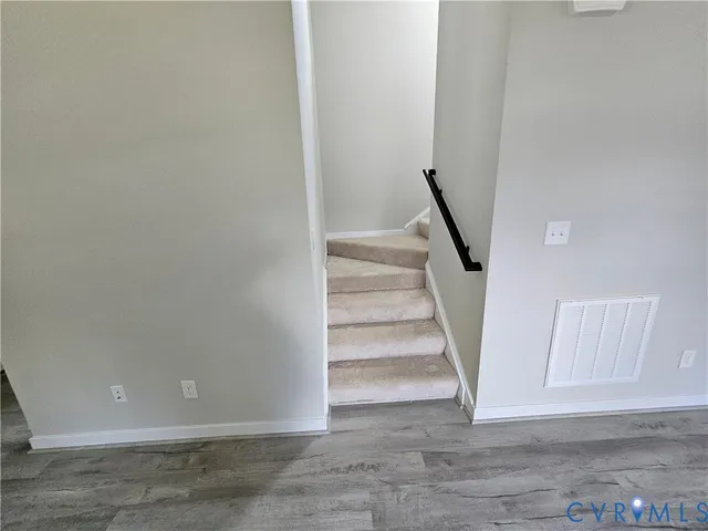 a view of entryway with stairs
