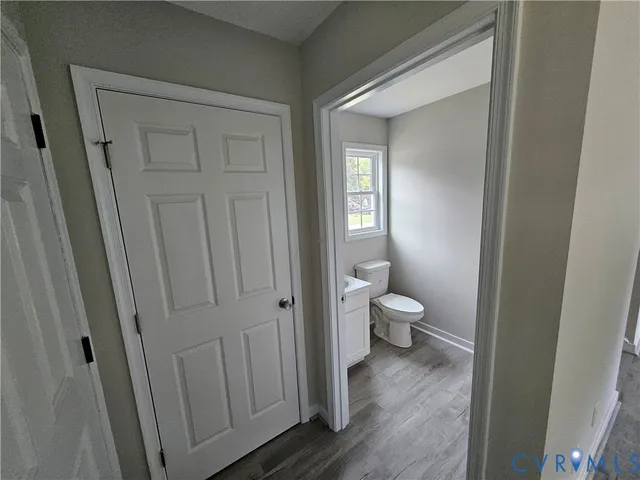 a bathroom with a toilet sink