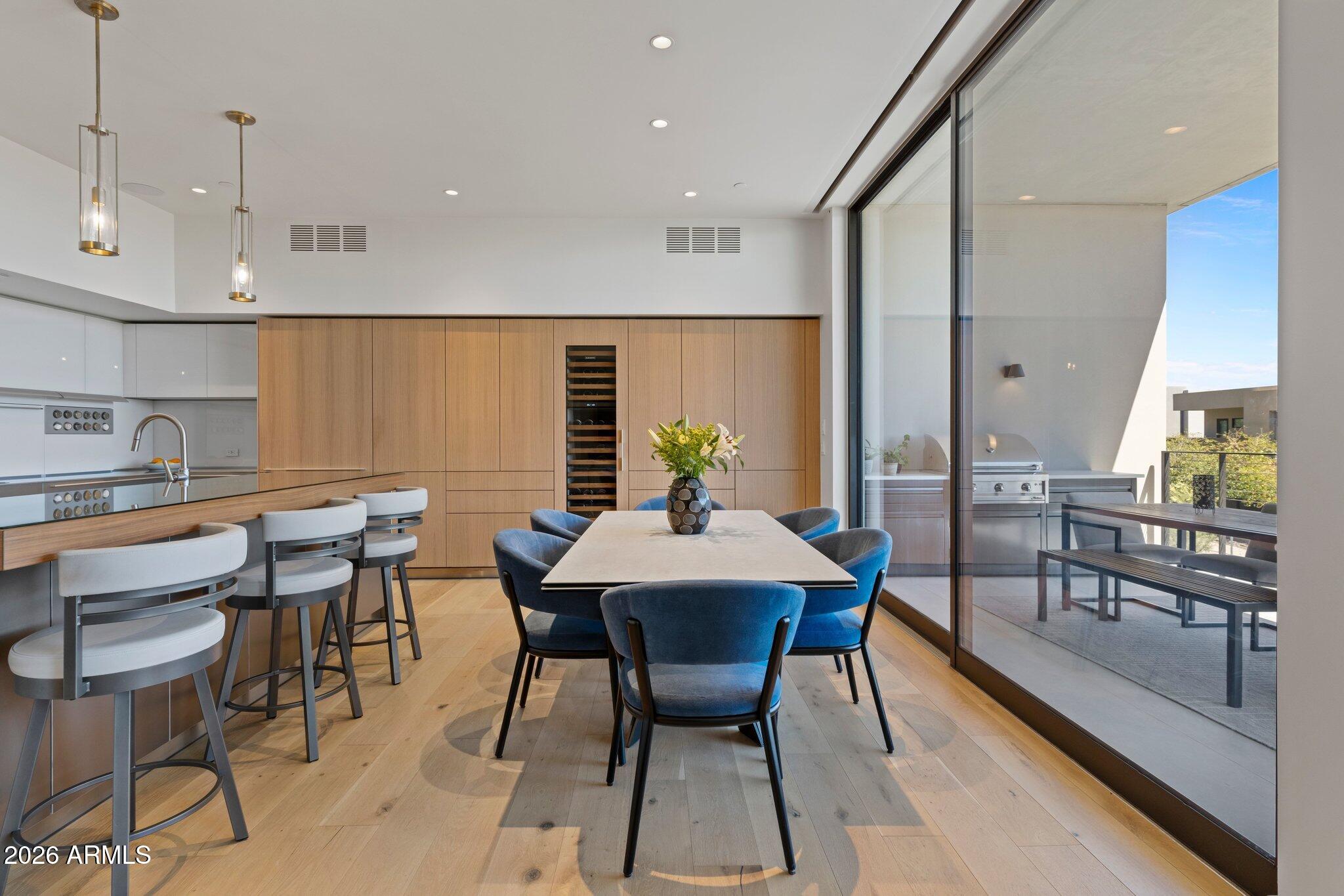 5000 North Camelback Ridge Drive, Unit 208 Scottsdale, AZ 85251 - Photo 17 of 53 a view of a dining room with furniture