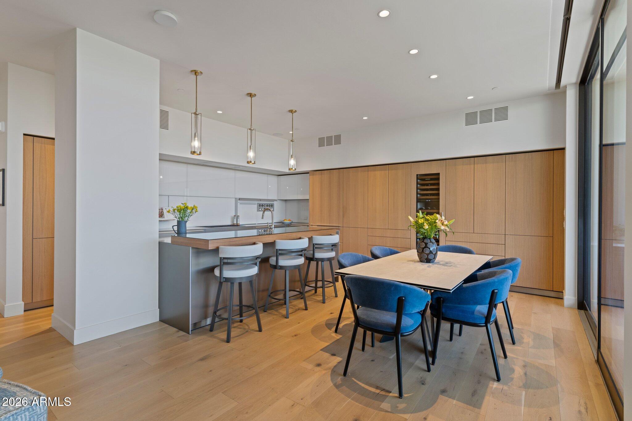 5000 North Camelback Ridge Drive, Unit 208 Scottsdale, AZ 85251 - Photo 18 of 53 a view of a dining room with furniture