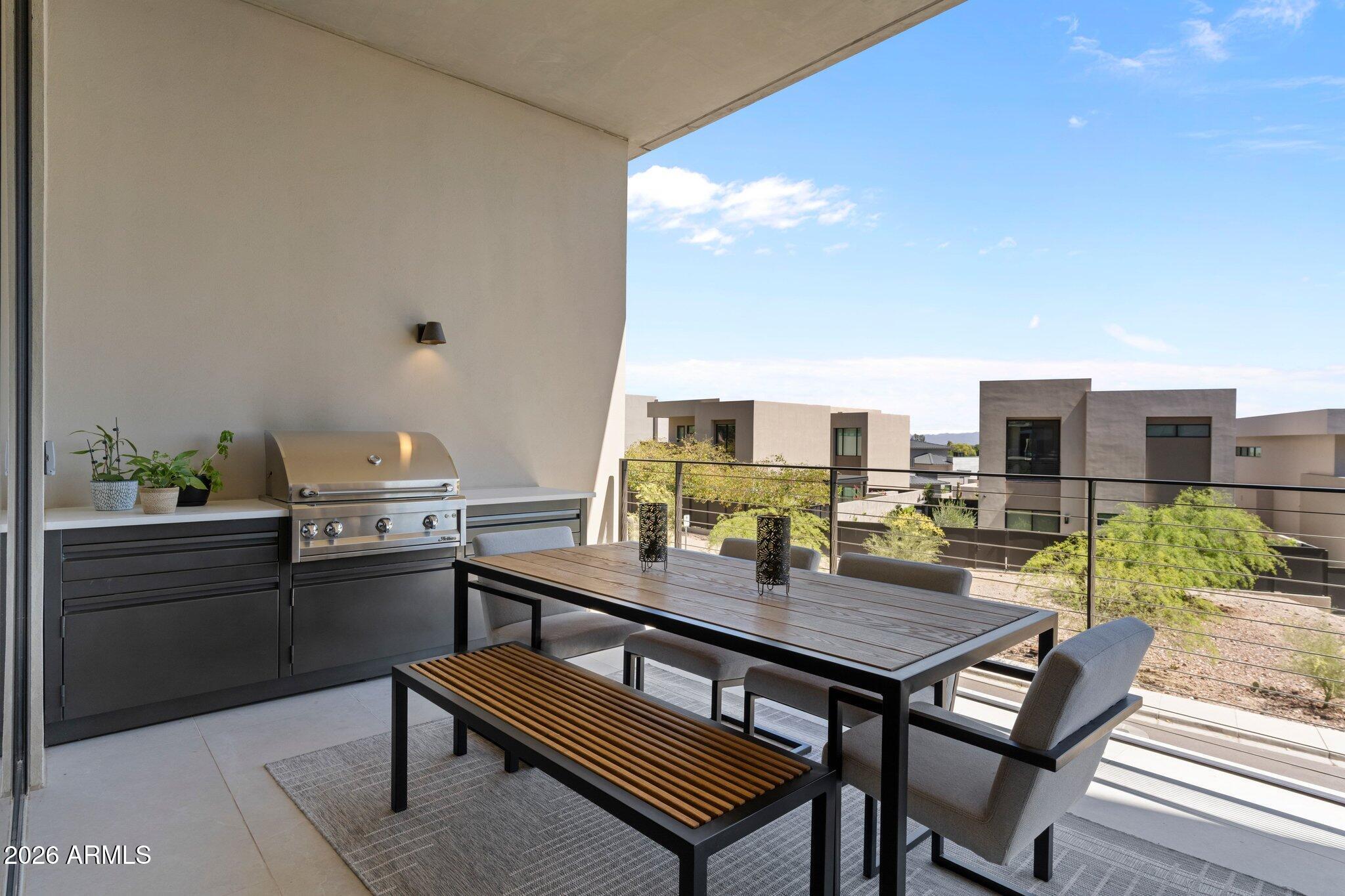 5000 North Camelback Ridge Drive, Unit 208 Scottsdale, AZ 85251 - Photo 21 of 53 a view of a terrace with furniture and garden