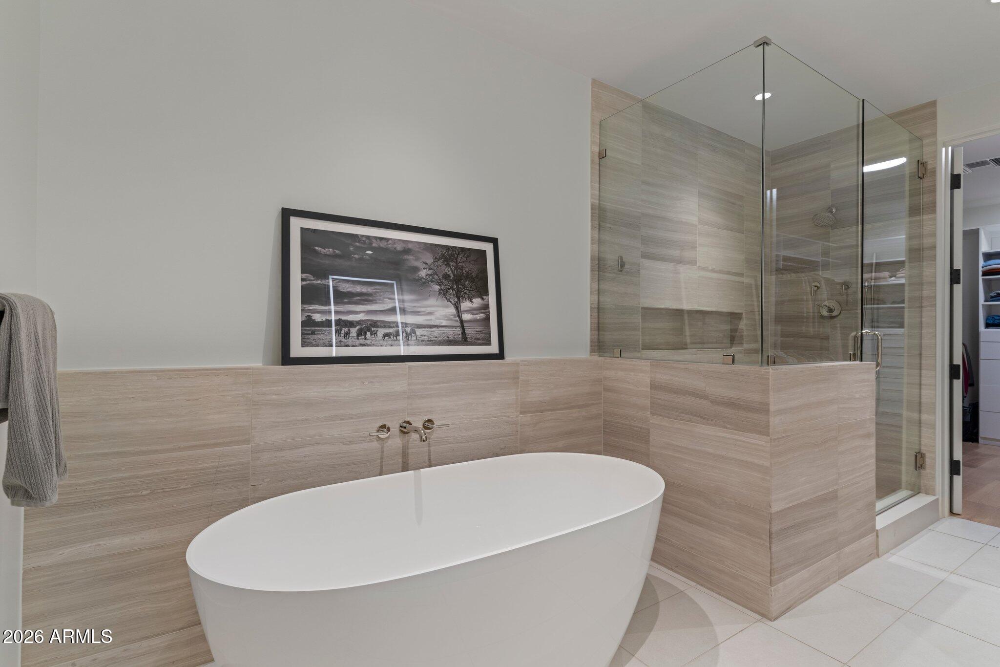 5000 North Camelback Ridge Drive, Unit 208 Scottsdale, AZ 85251 - Photo 28 of 53 a bathroom with a bathtub and shower