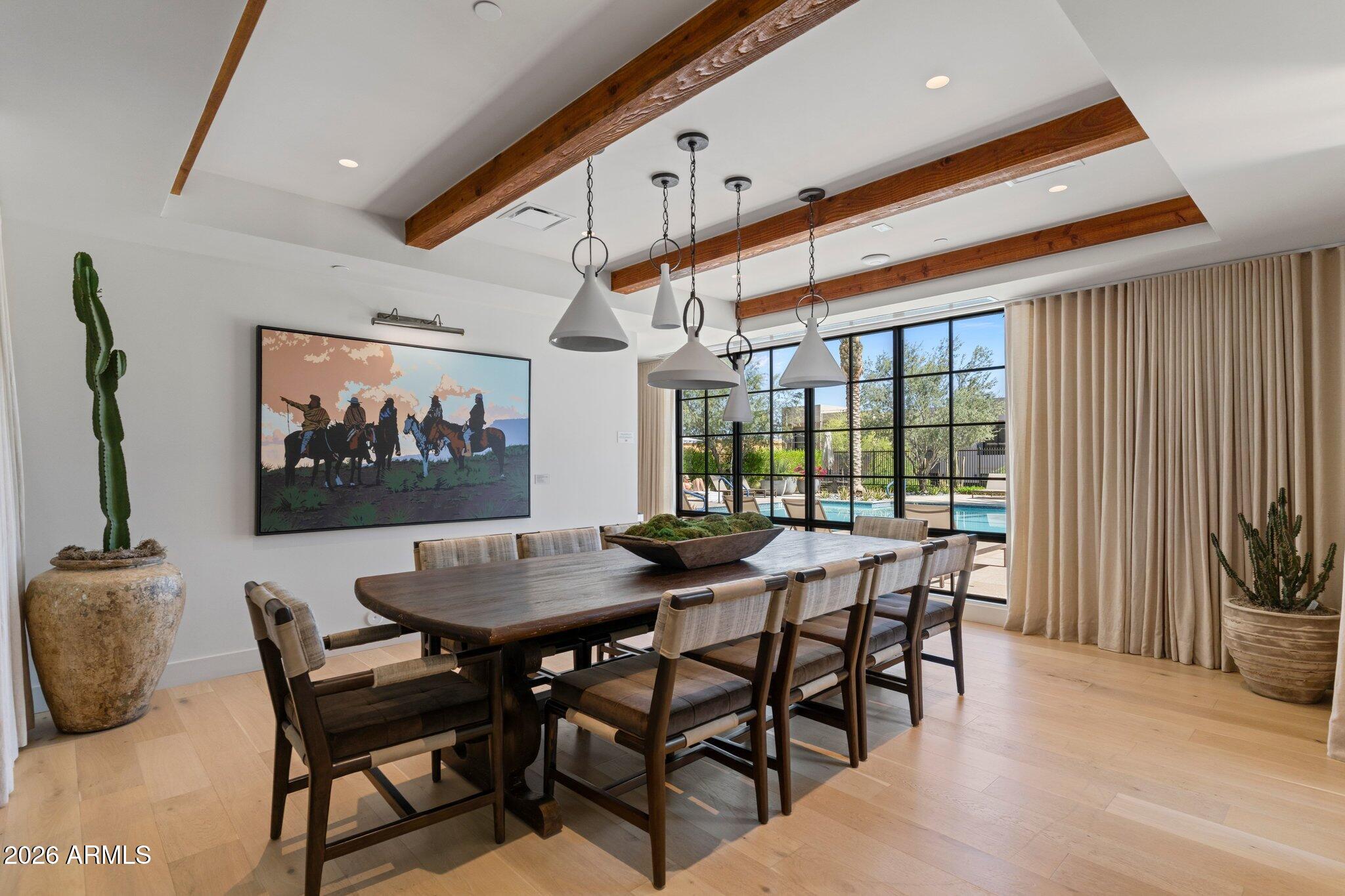 5000 North Camelback Ridge Drive, Unit 208 Scottsdale, AZ 85251 - Photo 44 of 53 a view of a dining room with furniture window and outside view
