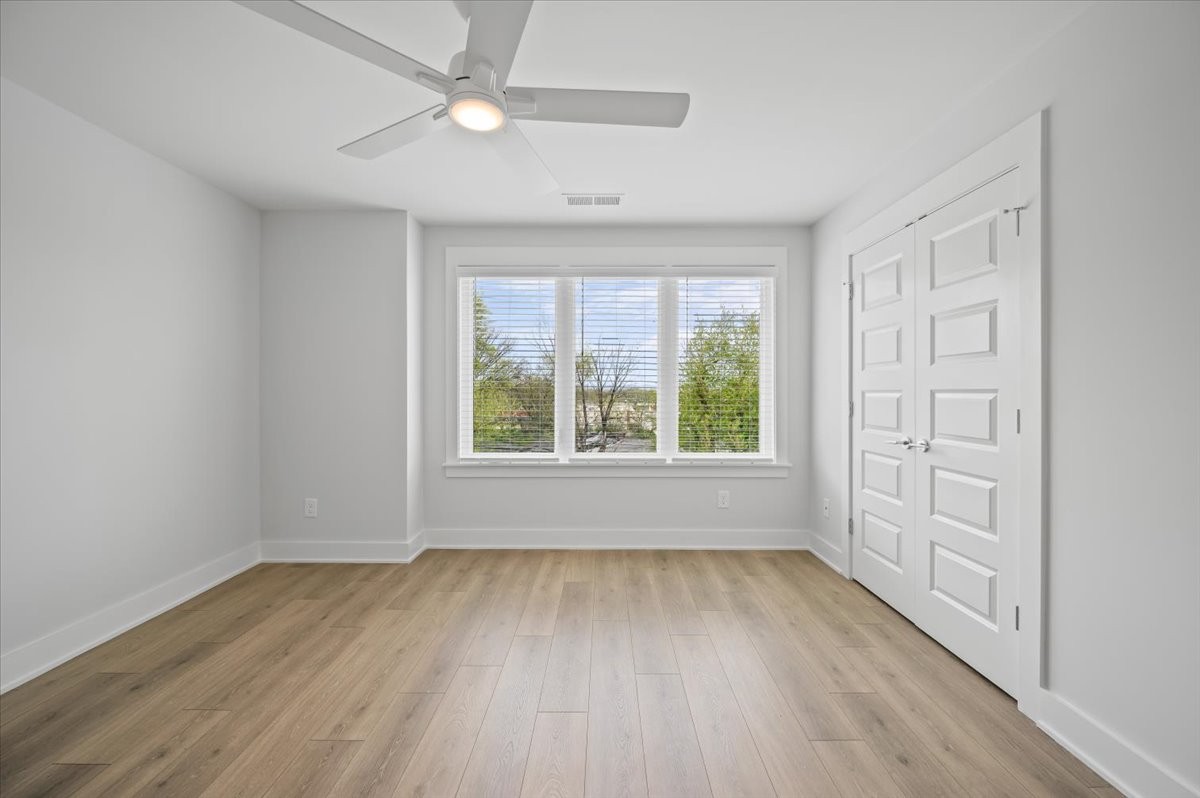 3045 B Hillside Road Nashville, TN 37207 - Photo 22 of 32 wooden floor in an empty room with a window