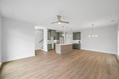 a view of kitchen with wooden floor