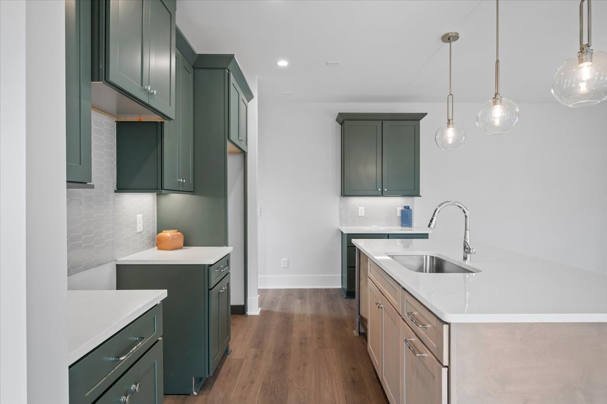 3045 B Hillside Road Nashville, TN 37207 - Photo 7 of 32 a kitchen with a sink and a refrigerator