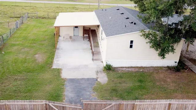 a view of balcony with floor to ceiling window and outdoor view