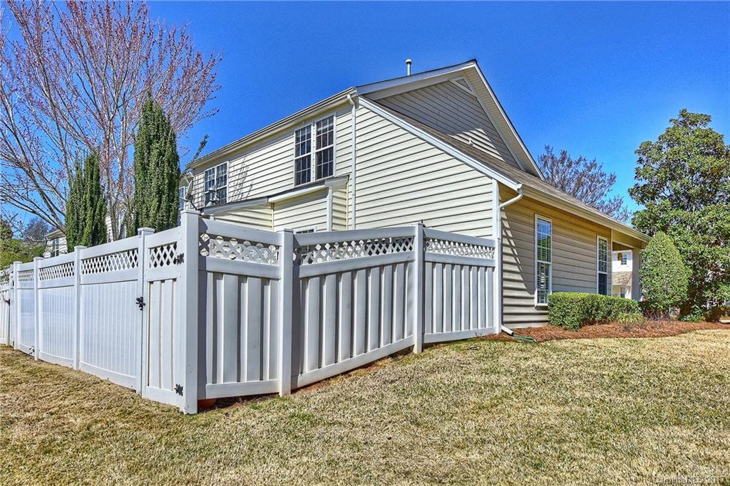 919 Azurine Circle, Unit 69 Fort Mill, SC 29708 - Photo 22 of 22 a view of a house with a backyard