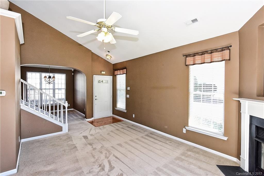 919 Azurine Circle, Unit 69 Fort Mill, SC 29708 - Photo 5 of 22 a view of an empty room with a window