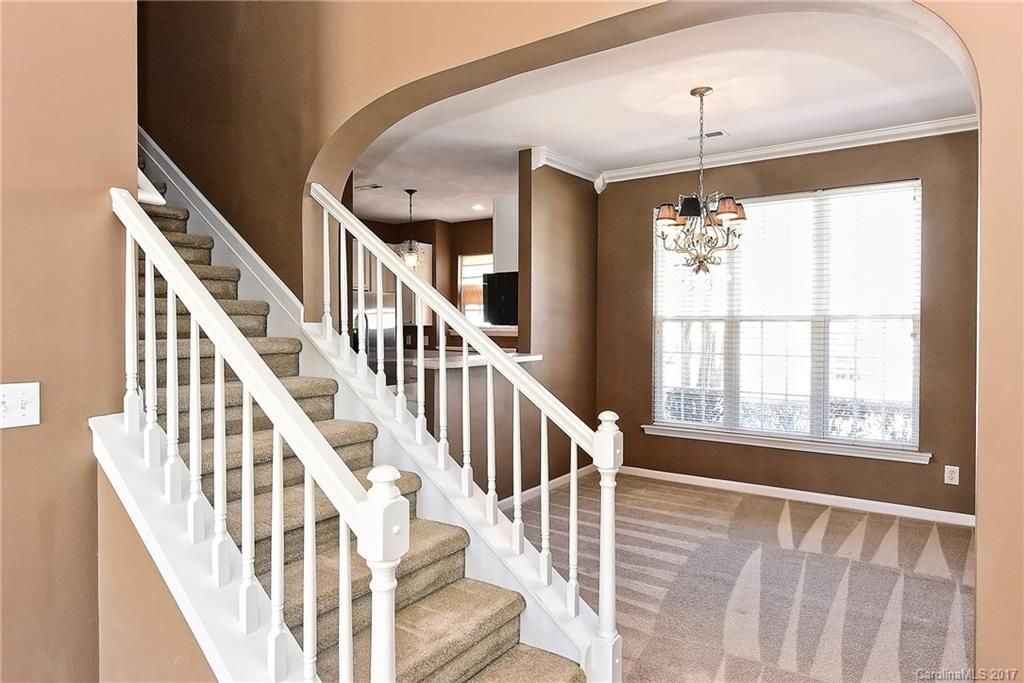 919 Azurine Circle, Unit 69 Fort Mill, SC 29708 - Photo 6 of 22 a view of an entryway with wooden floor