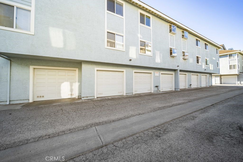 20345 Rue Crevier Canyon Country, CA 91351 - Photo 19 of 20 a front view of a building with a road