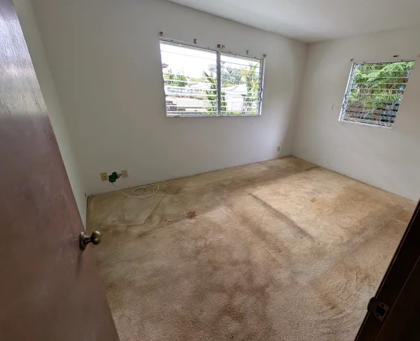 an empty room with windows