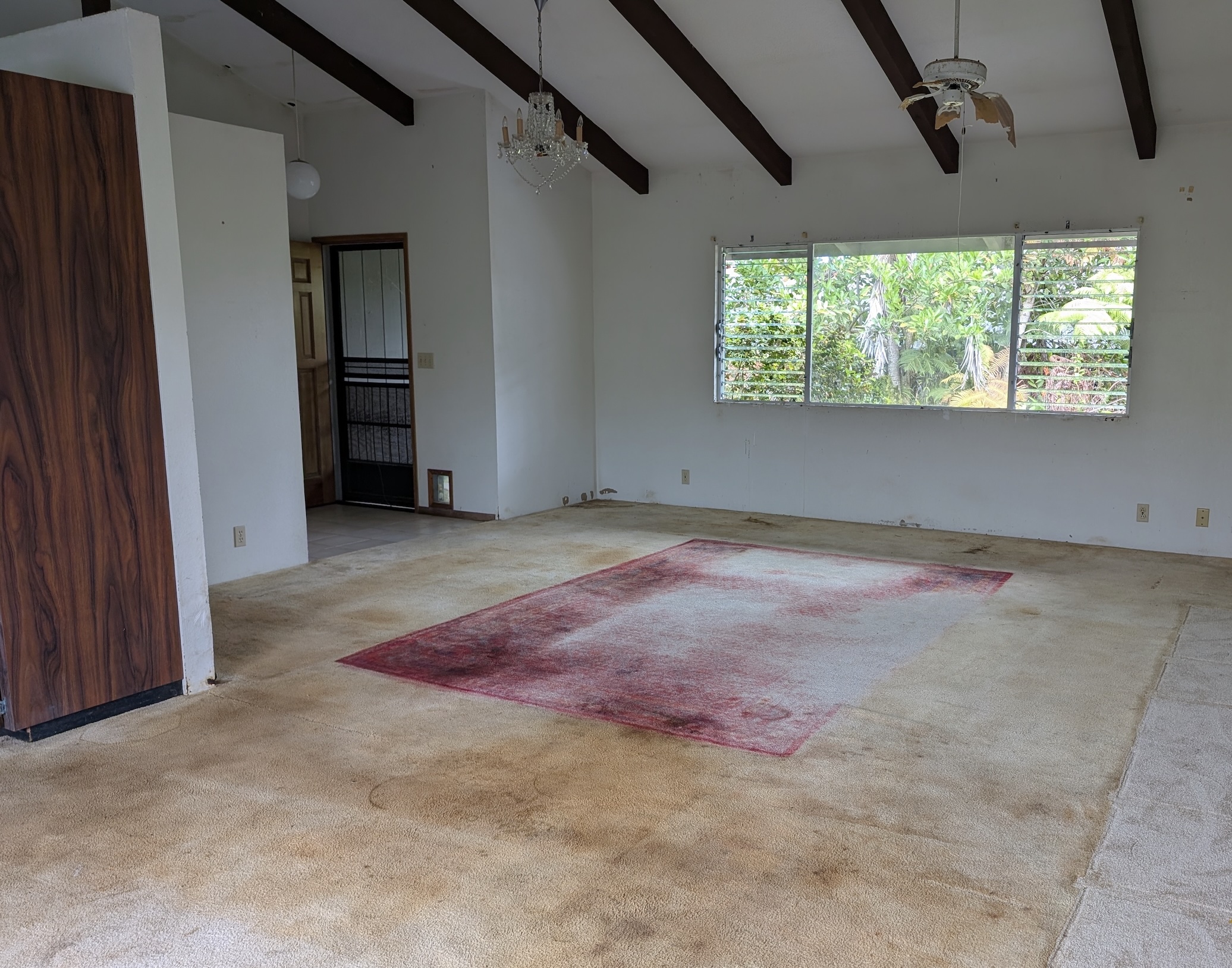 52 Wawai Loop Hilo, HI 96720 - Photo 12 of 18 an empty room with windows
