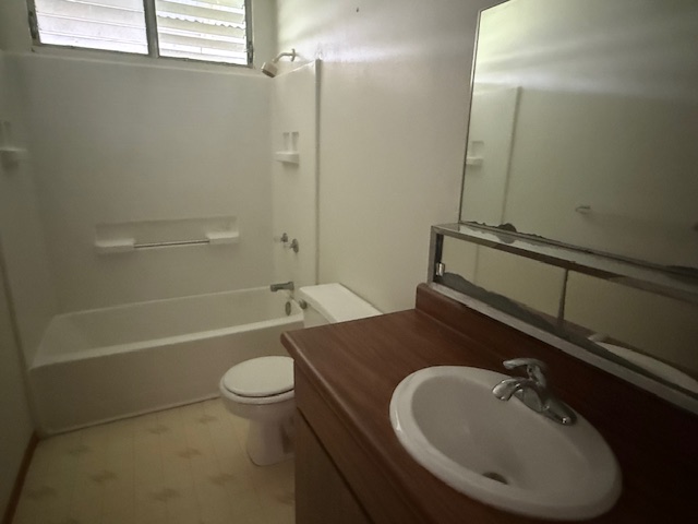 52 Wawai Loop Hilo, HI 96720 - Photo 15 of 18 a bathroom with a sink a toilet and shower