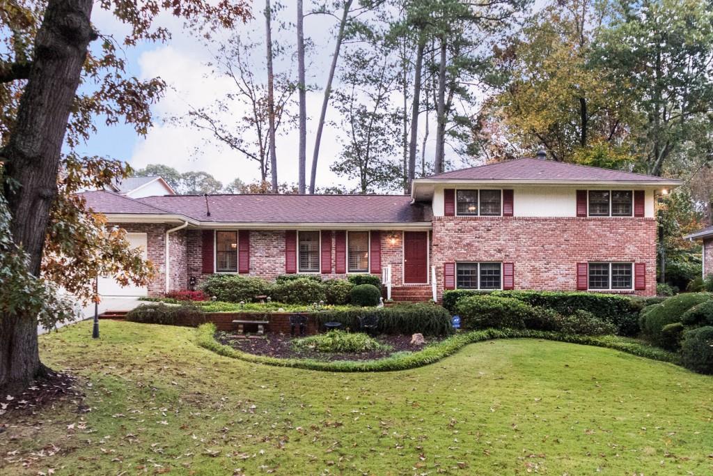 Front Exterior of meticulously maintained split level home. Quiet contained neighborhood - no cut thru streets make walking or bike riding easy and safe. Two-car garage.
