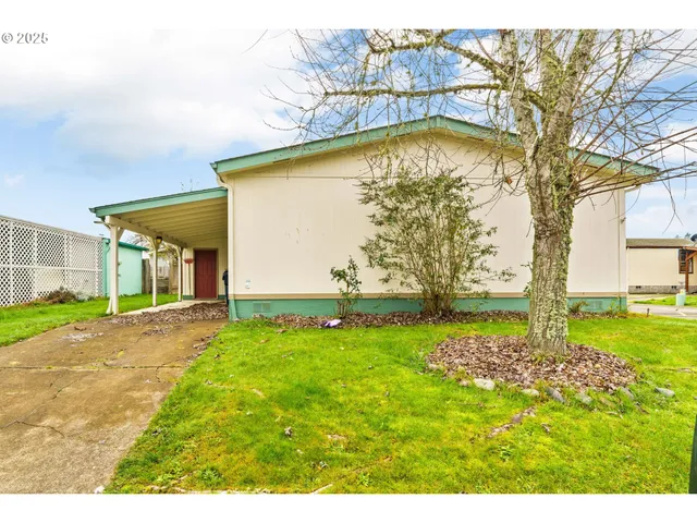 a view of swimming pool with a yard