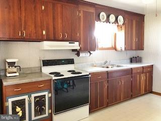107 Cooper Avenue Rising Sun, MD 21911 - Photo 6 of 18 Wall of cabinetry & Counterspace
