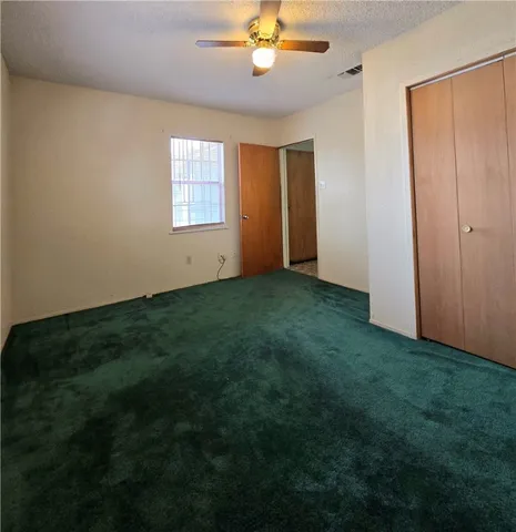 a view of a livingroom with a fan