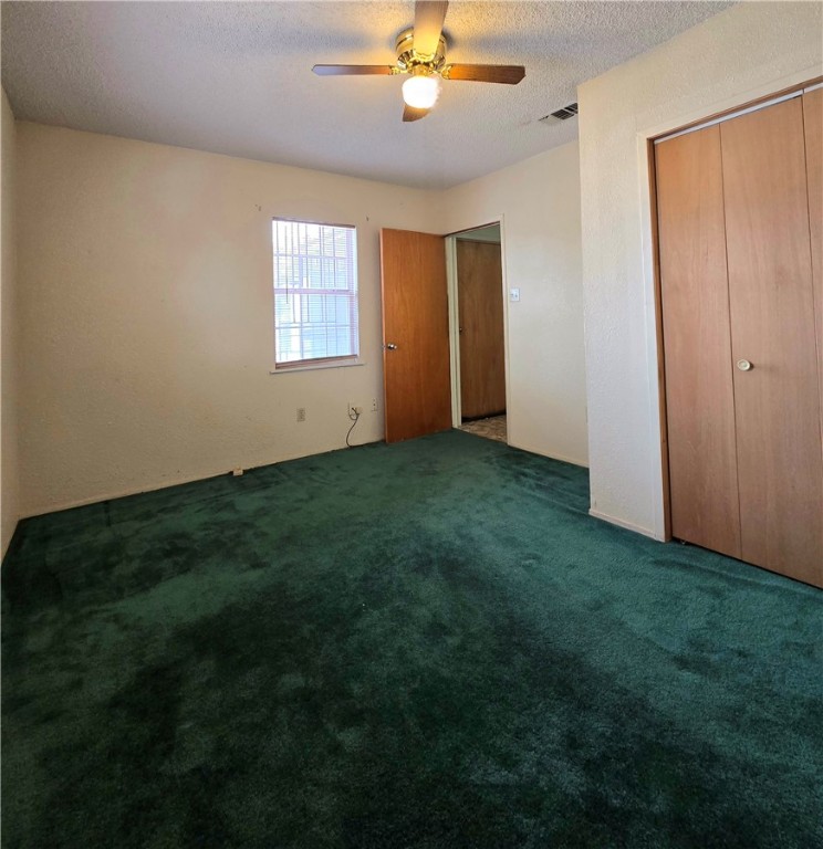 1105 East 5th Street Alice, TX 78332 - Photo 11 of 20 a view of a livingroom with a fan
