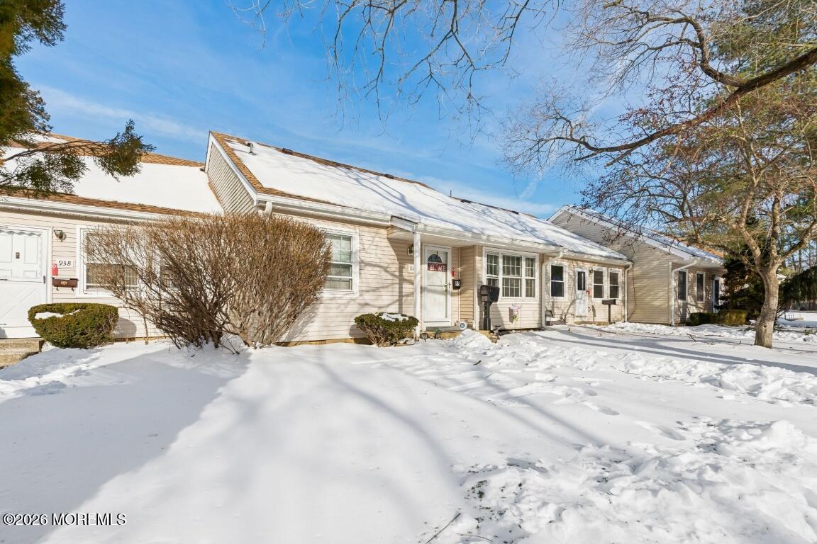 93 Halls Croft Road, Unit C Freehold, NJ 07728 - Photo 25 of 25 a view of a house with snow in front of it