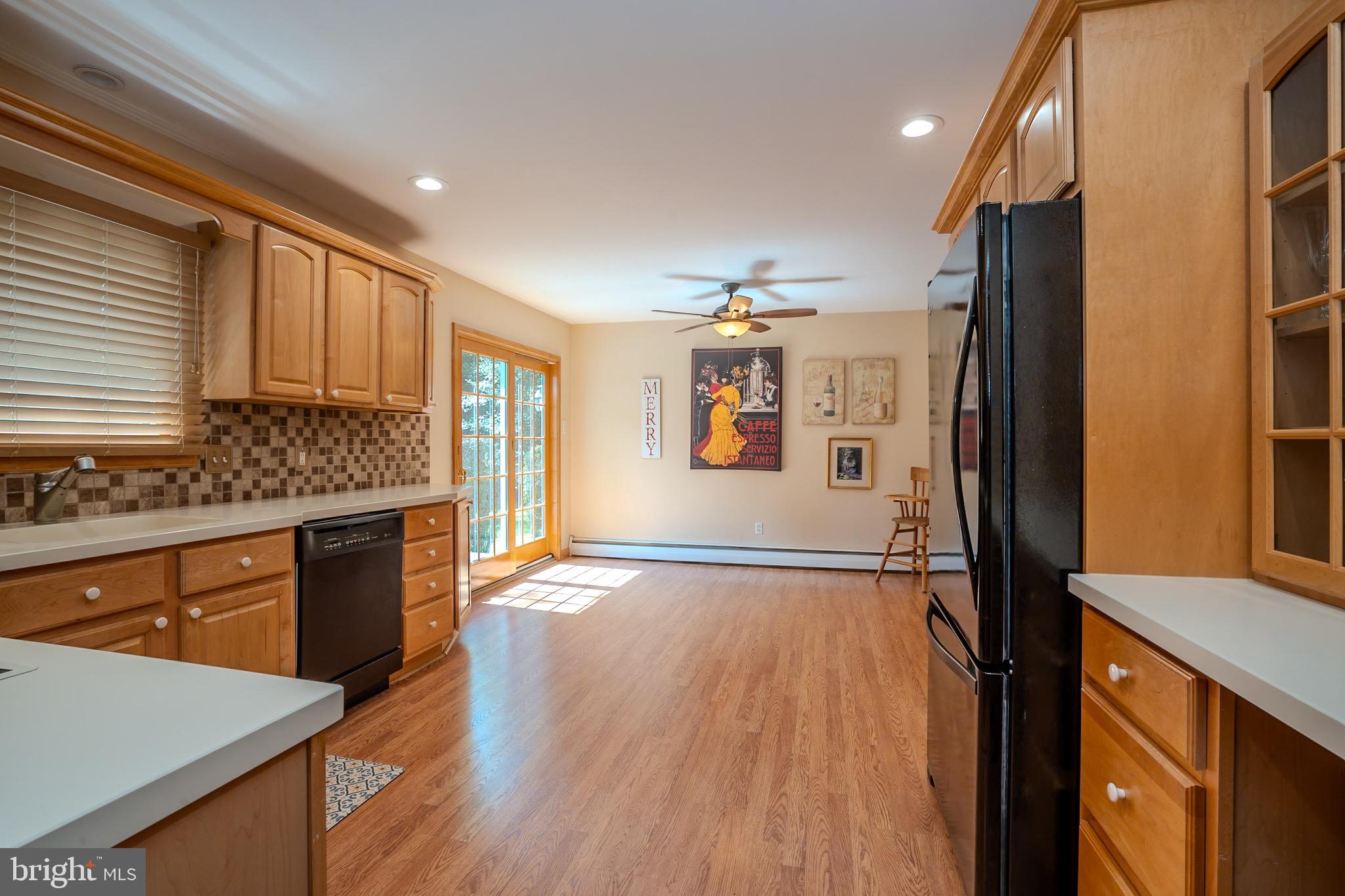 3 Manor Avenue Princeton, NJ 08540 - Photo 13 of 35 a kitchen with stainless steel appliances granite countertop a refrigerator and a stove top oven