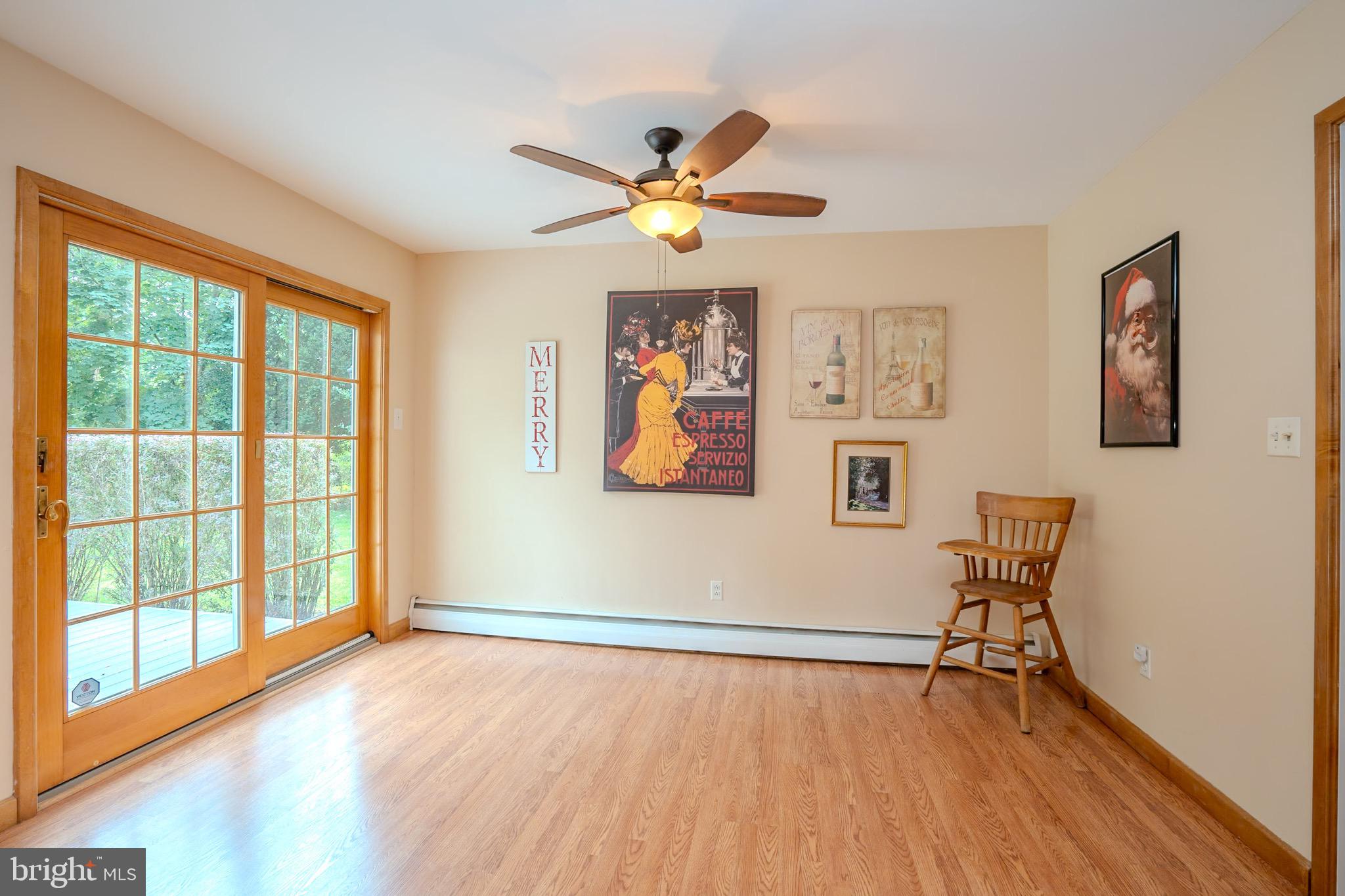 3 Manor Avenue Princeton, NJ 08540 - Photo 15 of 35 a view of an empty room with window and wooden floor