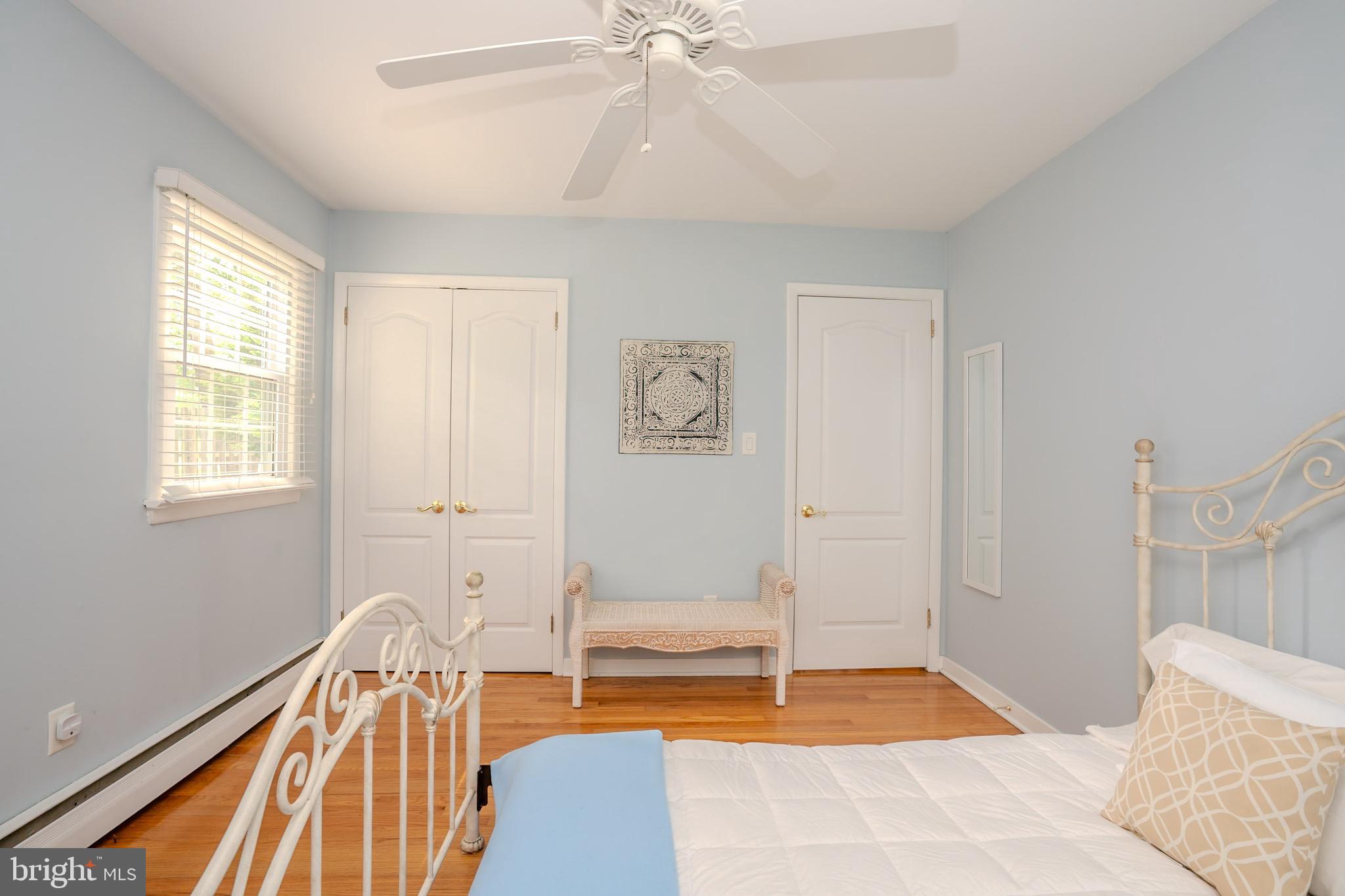 3 Manor Avenue Princeton, NJ 08540 - Photo 20 of 35 a bedroom with a bed and a chandelier
