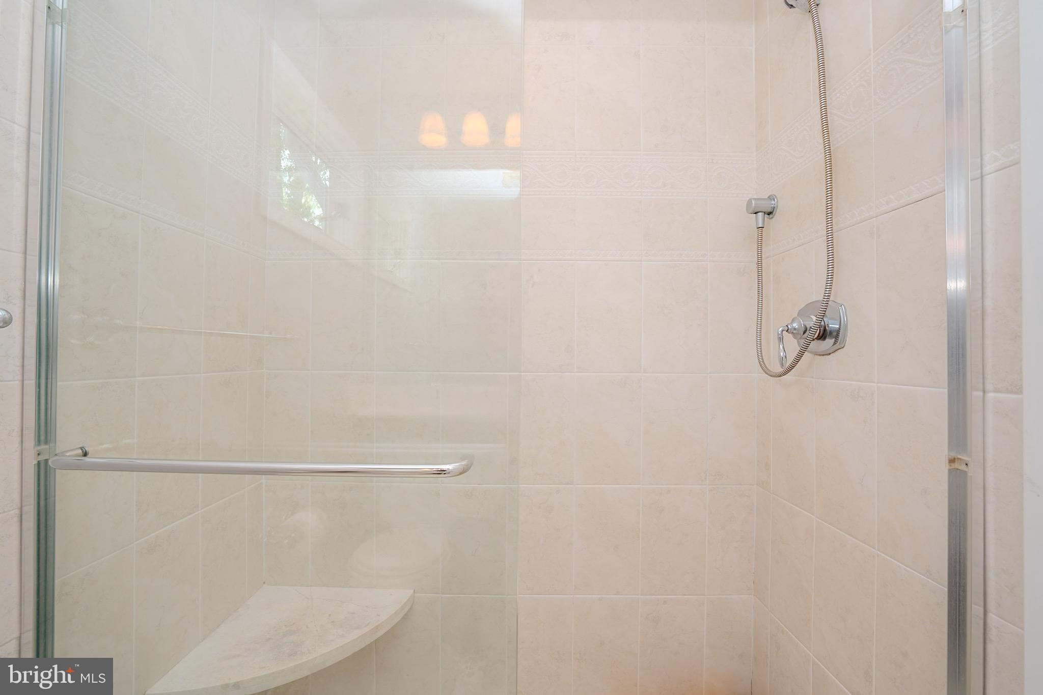 3 Manor Avenue Princeton, NJ 08540 - Photo 25 of 35 a bathroom with a glass shower door