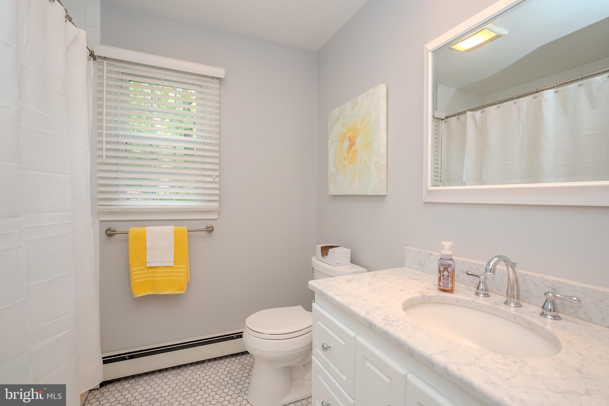 3 Manor Avenue Princeton, NJ 08540 - Photo 26 of 35 a bathroom with a granite countertop toilet sink and mirror