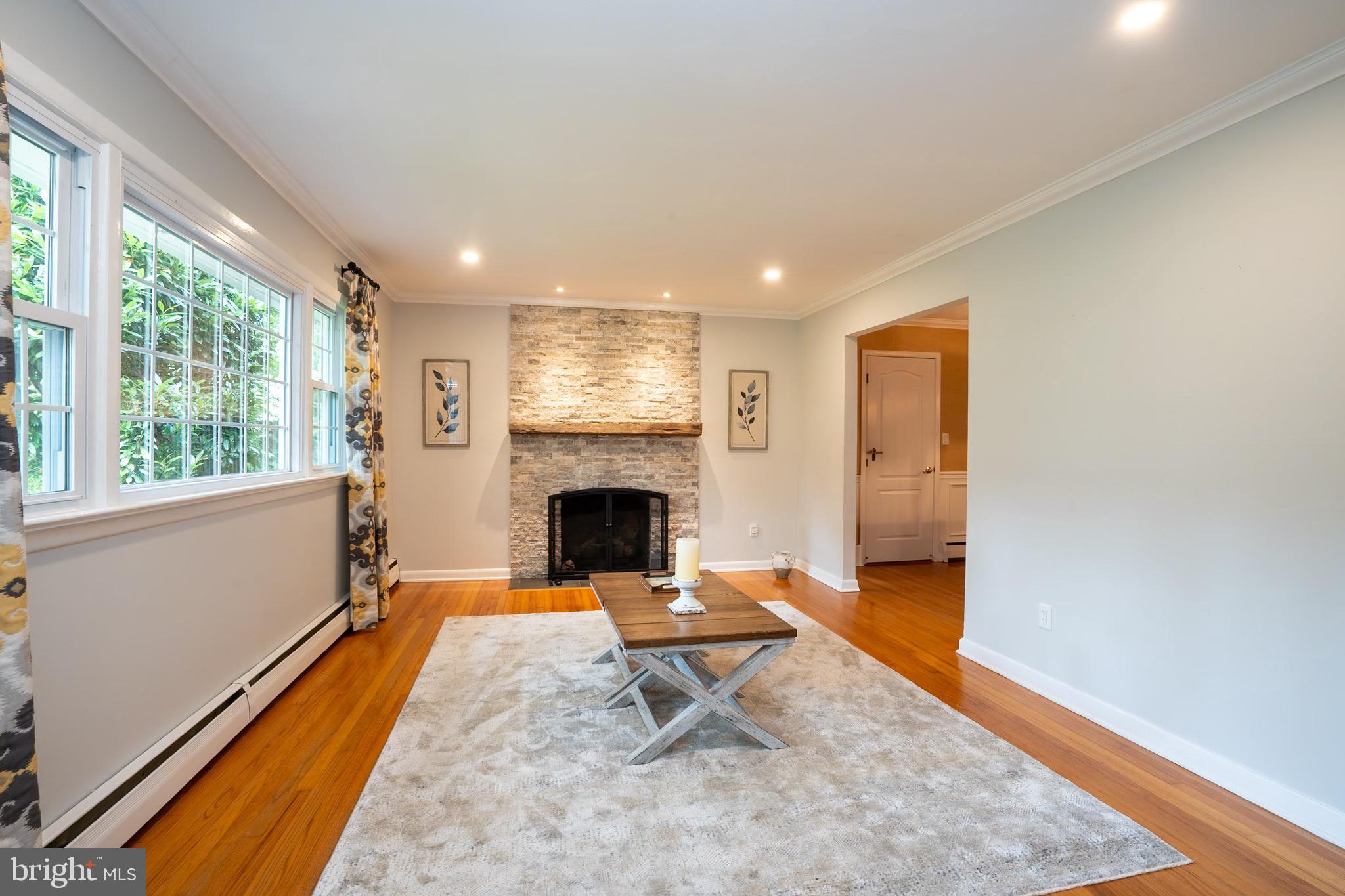 3 Manor Avenue Princeton, NJ 08540 - Photo 6 of 35 a living room with furniture and a fireplace