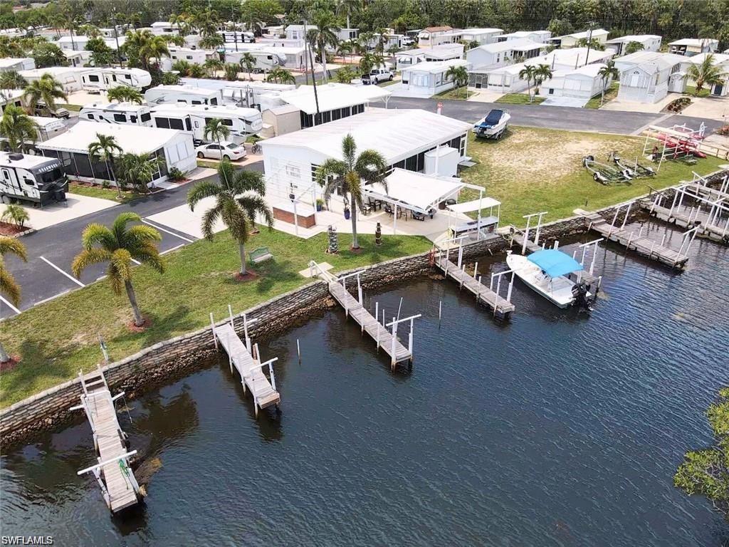 173 Redwood Lane, Unit 8 Naples, FL 34114 - Photo 17 of 19 an aerial view of a swimming pool with outdoor seating