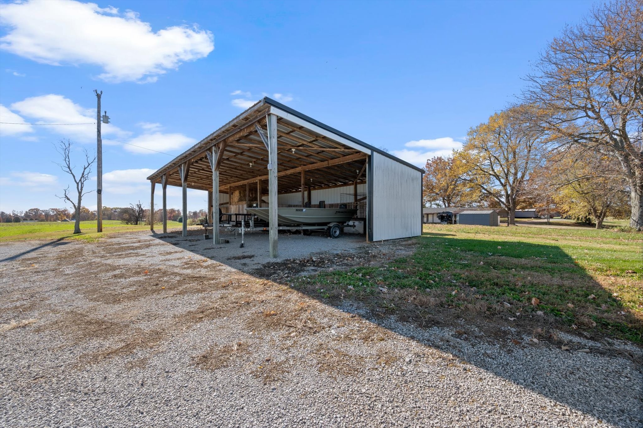 5971 Wayman Dunn Road Springfield, TN 37172 - Photo 27 of 31 a view of a house with backyard and trees