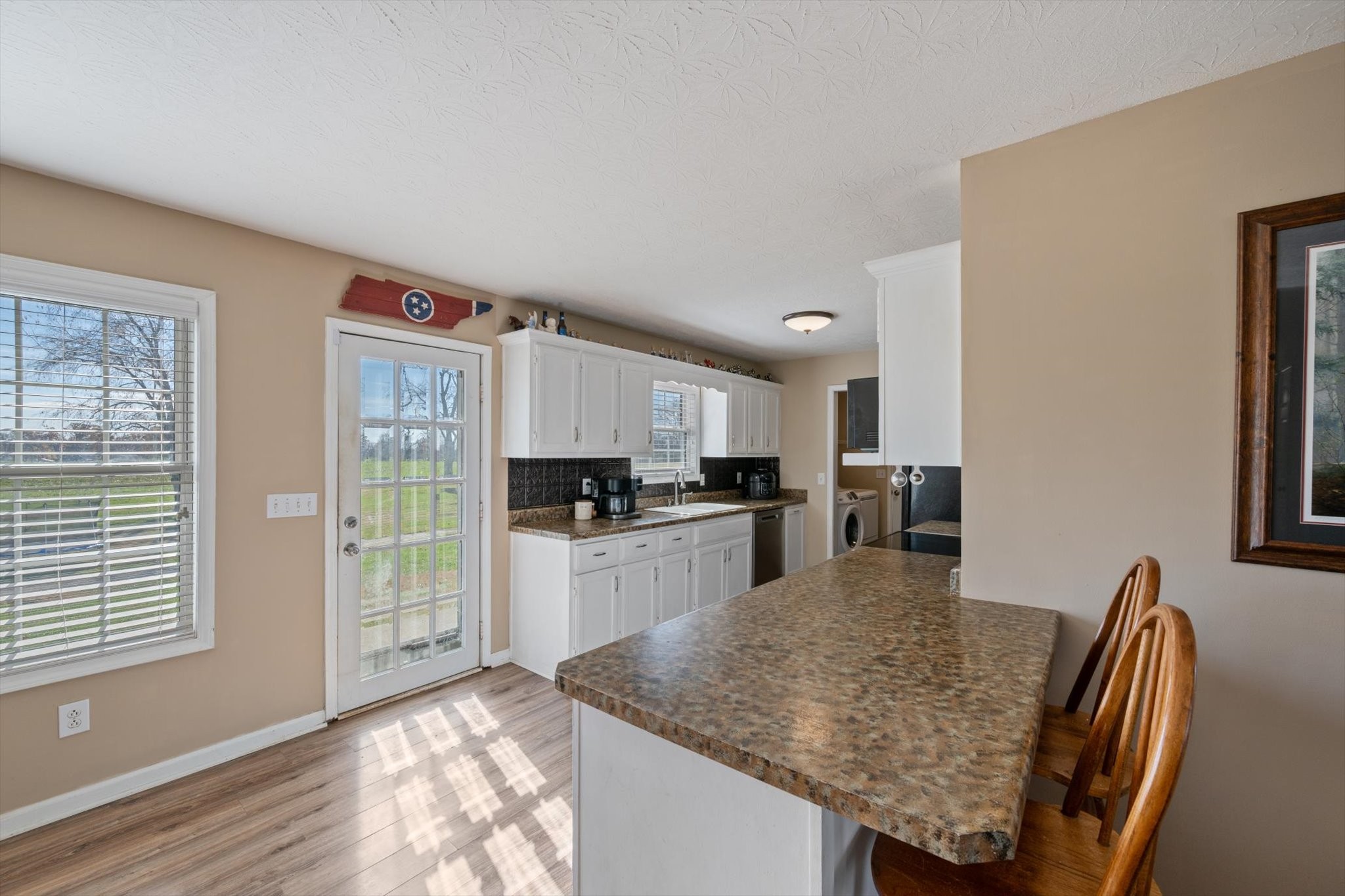 5971 Wayman Dunn Road Springfield, TN 37172 - Photo 9 of 31 a kitchen with a table and chairs in it