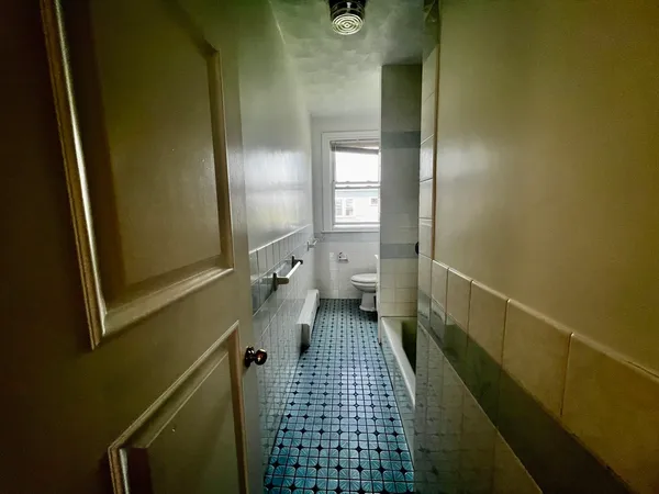 a bathroom with a sink and a toilet