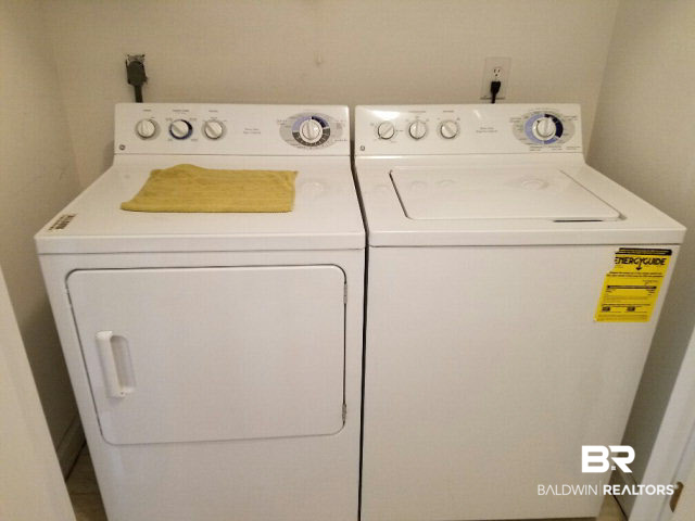 28875 Perdido Beach Boulevard, Unit 1A Orange Beach, AL 36561 - Photo 22 of 25 Side by side Washer and Dryer for more capacity