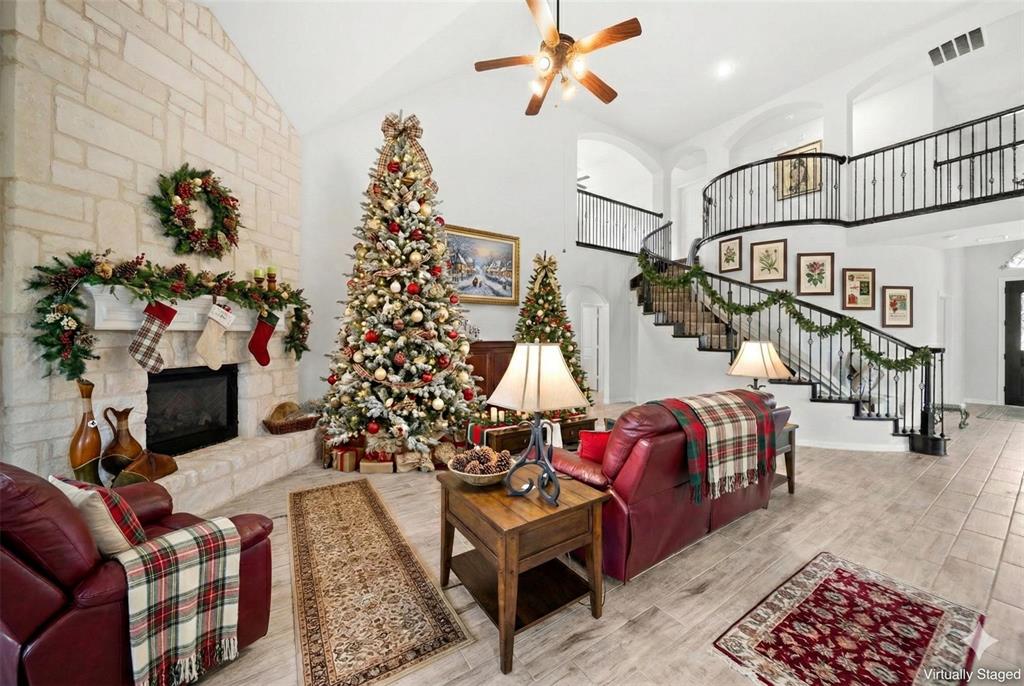412 Bastrop Road Forney, TX 75126 - Photo 17 of 39 a living room with furniture and a potted plant