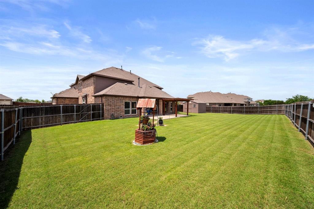 412 Bastrop Road Forney, TX 75126 - Photo 38 of 39 a aerial view of a house with swimming pool and furniture
