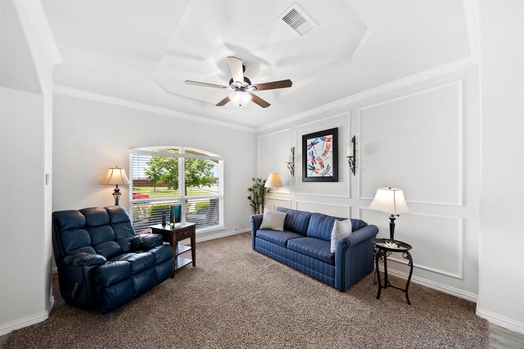 412 Bastrop Road Forney, TX 75126 - Photo 7 of 39 a living room with furniture and a large window