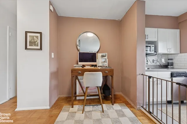 a kitchen with stainless steel appliances granite countertop a sink stove and microwave