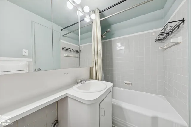 a workspace with furniture and mirror