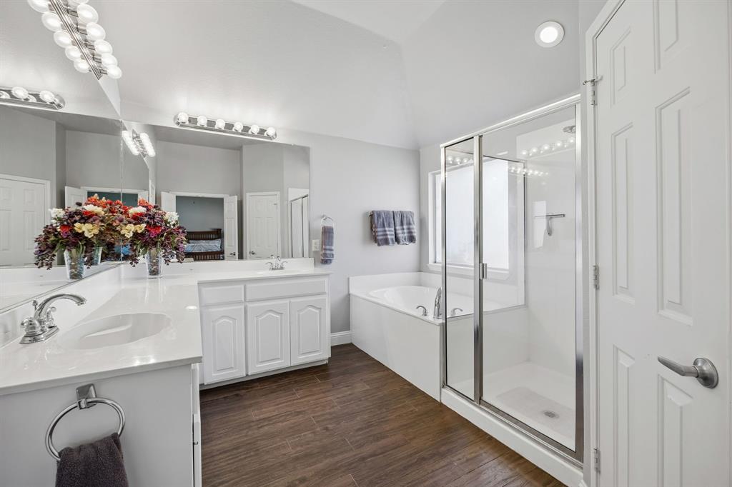 4133 Drexmore Road Fort Worth, TX 76244 - Photo 16 of 31 a bathroom with a double vanity sink mirror and shower