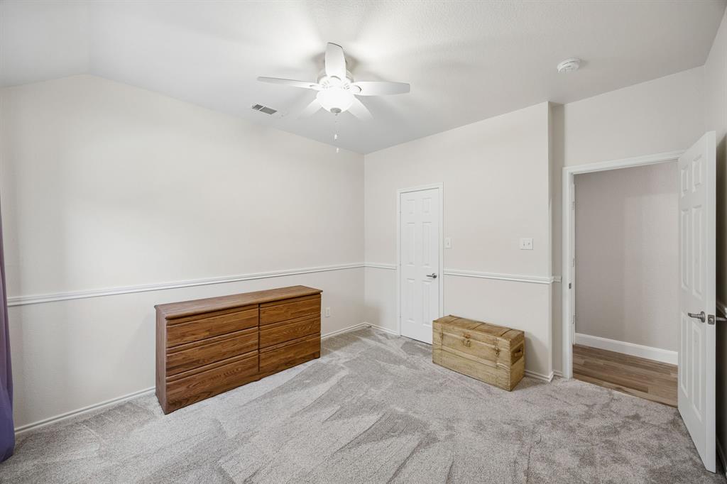 4133 Drexmore Road Fort Worth, TX 76244 - Photo 20 of 31 an empty room with windows