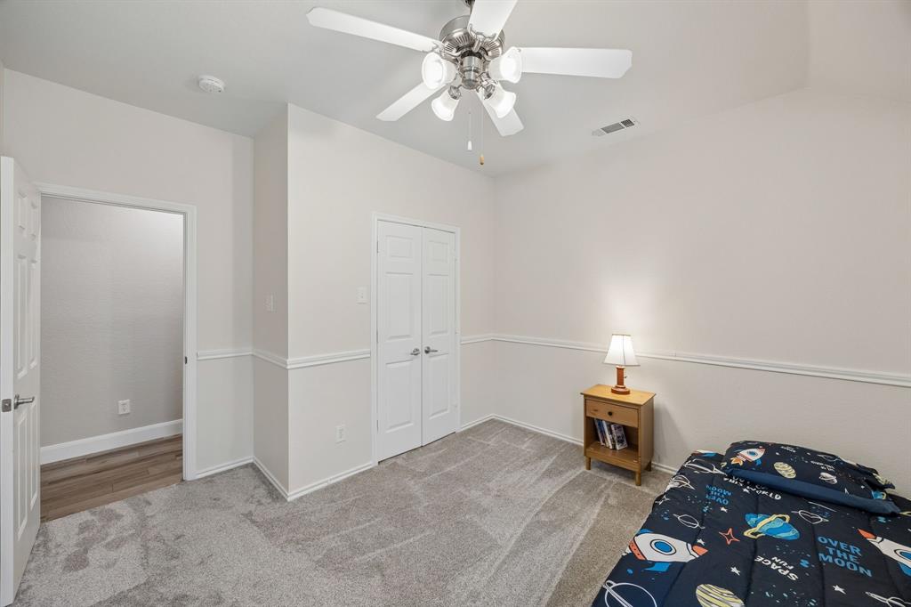 4133 Drexmore Road Fort Worth, TX 76244 - Photo 21 of 31 a view of a livingroom with wooden floor