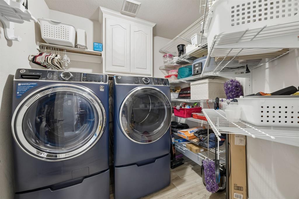 4133 Drexmore Road Fort Worth, TX 76244 - Photo 25 of 31 a utility room with sink dryer and washer