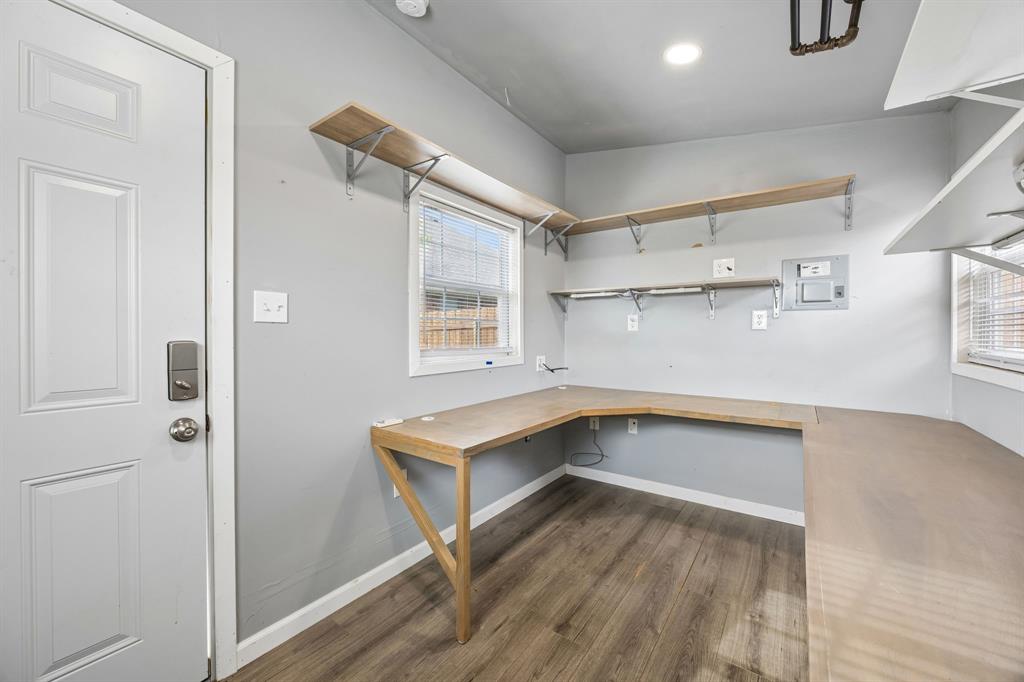 4133 Drexmore Road Fort Worth, TX 76244 - Photo 26 of 31 a kitchen with cabinets and wooden floors