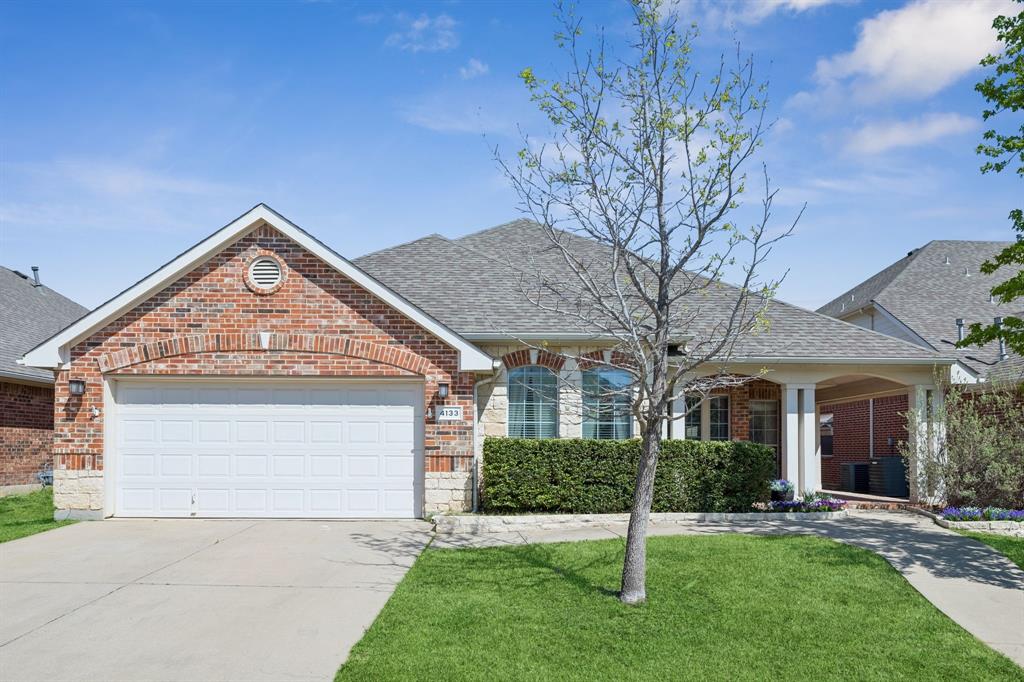 4133 Drexmore Road Fort Worth, TX 76244 - Photo 6 of 31 front view of a house with a yard